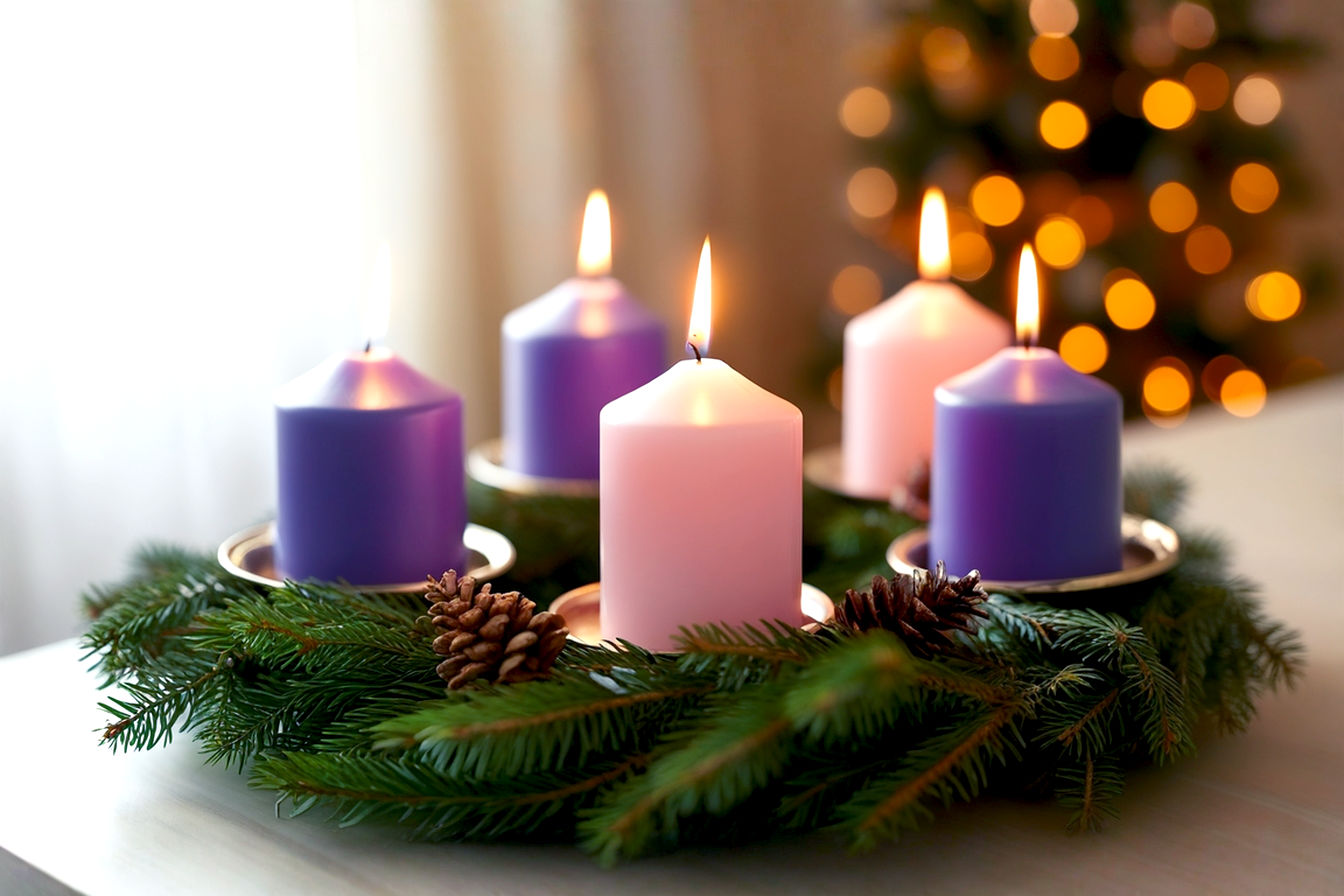 A professional, lifelike photograph capturing the serene and spiritual essence of a Catholic Advent wreath. The composition should feature a beautifully arranged evergreen wreath with four lit candles (two purple, one pink, and one purple, with the pink candle prominently glowing). The lighting should be soft, warm, and evocative, suggesting a cozy, contemplative indoor setting, perhaps with a subtle bokeh background of a window or a blurred fireplace. Focus on the intricate details of the evergreen branches and the gentle flicker of the flames. The mood should be peaceful, reflective, and hopeful, embodying the core theme of spiritual anticipation for Christmas. Shot with a shallow depth of field, highlighting the wreath as the central subject. High-resolution, professional photography style.