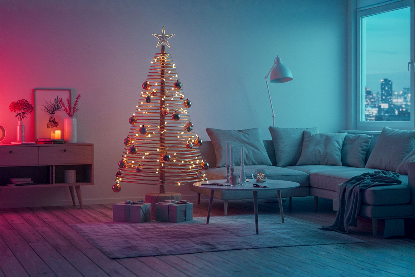 Professional photography, wide shot, modern living room, soft, warm, diffused natural light filtering from a large window. In the center, a stylish, non-traditional Christmas tree made from sleek, minimalist wooden dowels arranged in a geometric cone shape, subtly adorned with delicate, warm white LED fairy lights and a few metallic, spherical ornaments. The room features contemporary furniture in neutral tones (greys, creams, light wood) and subtle holiday accents. A cozy, inviting atmosphere. High-resolution, sharp focus on the tree, shallow depth of field, professional studio lighting setup, editorial style.